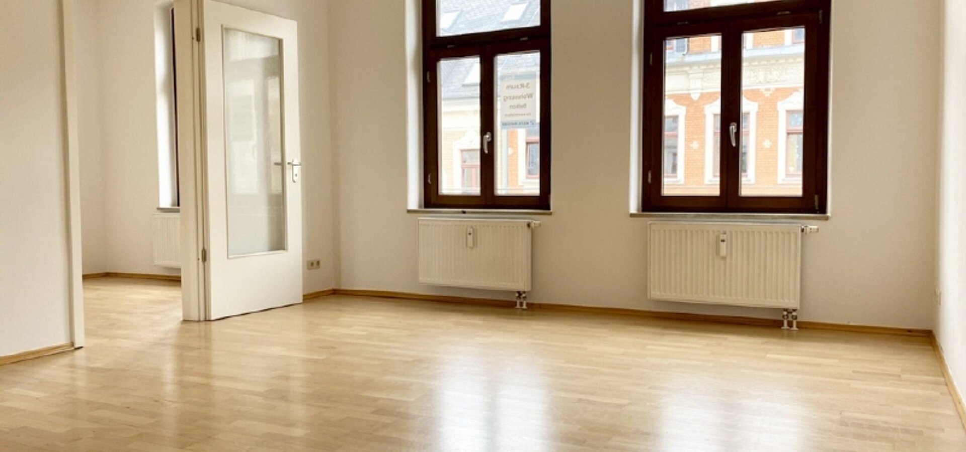 Wohnzimmer mit Küche